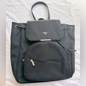 Prada Black Nylon Backpack - Front Pocket zipper - Back zipper access - FlapTop